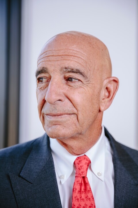 Portrait of Thomas Barrack Jr. in suit and tie, looking toward the camera with serious expression—close-up headshot.
